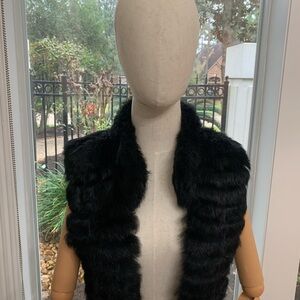 Black vintage fur reversible vest.